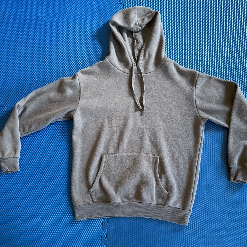 Gender neutral light gray hoodie